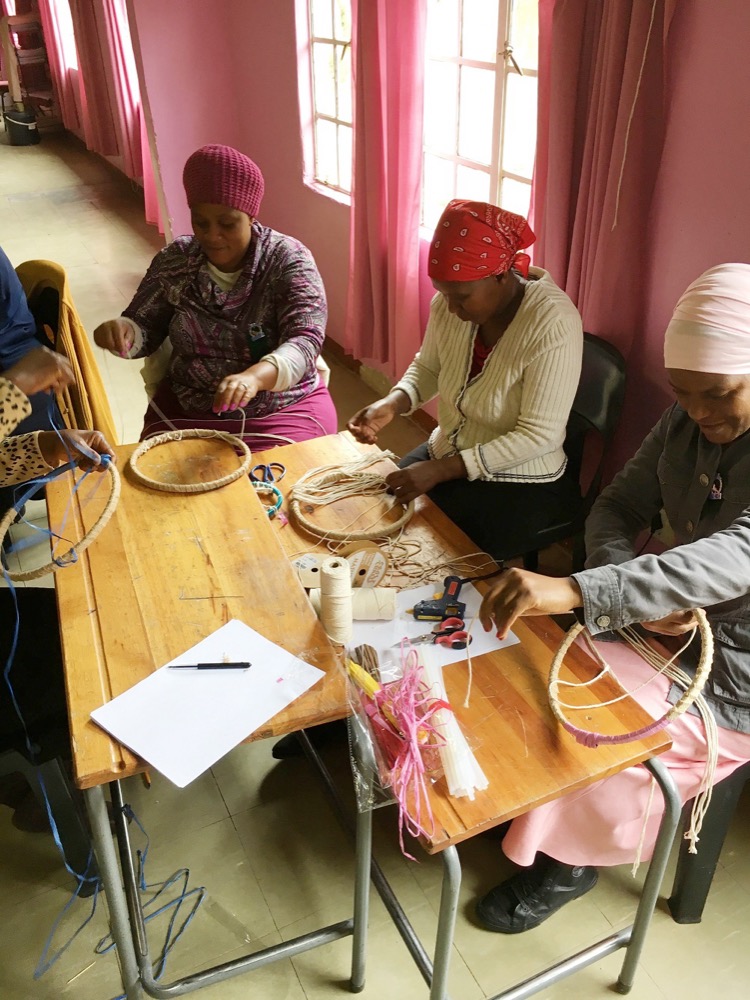 Children weaving baskets